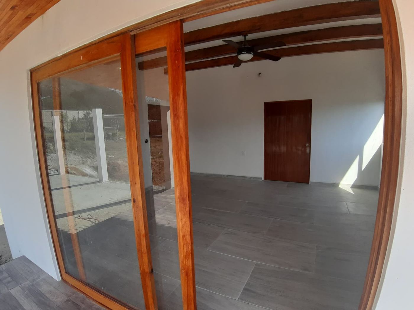 Casa de la montaña · cancelería de madera · Construq · Arq. Almira Hernández Salinas