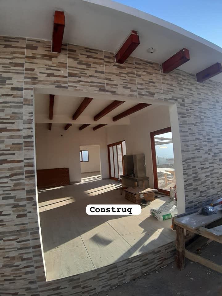 Muro de piedra y vigas · Construq · Arq. Almira Hernández Salinas
