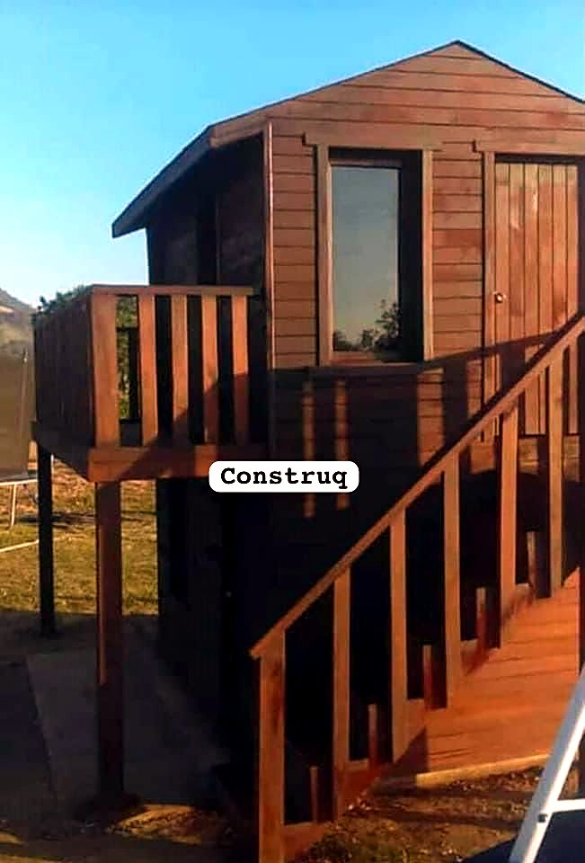 Casa de madera · escalera · Construq · Arq. Almira Hernández Salinas